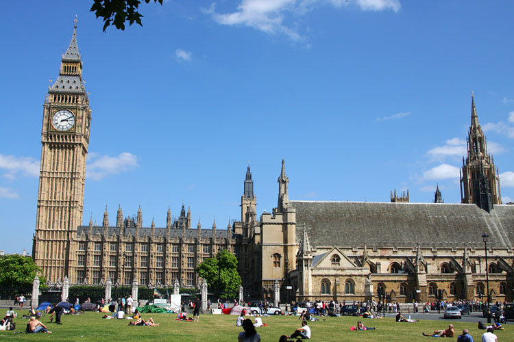 Sunbathing behind the Houses of Parliament